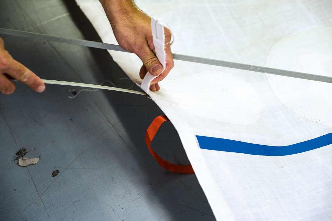 Relax the sail battens or, better still, take them out completely. Then the cloth can be folded and packed much smaller