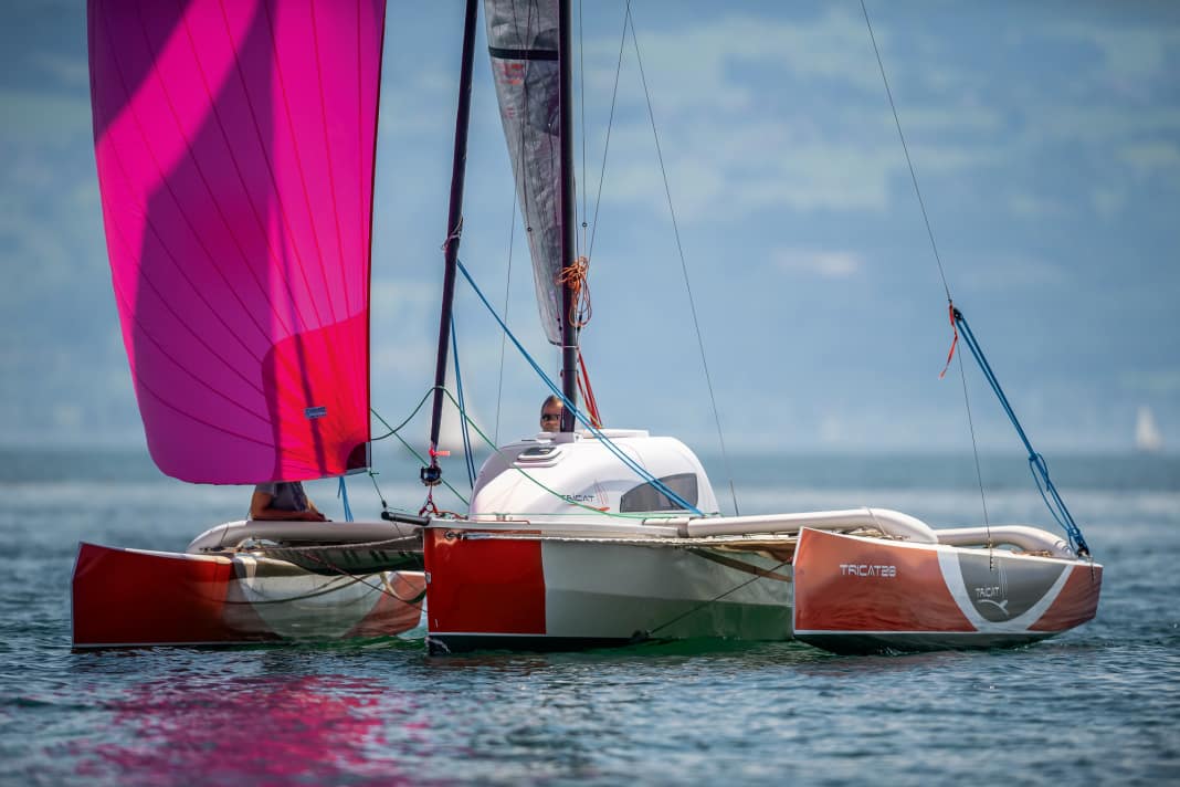 Contrasting. The high cabin superstructure does not match the sporty hulls visually, but provides plenty of space below deck