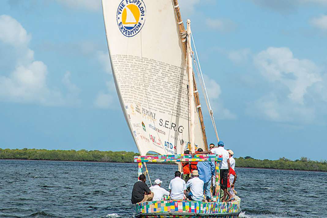 30,000 colourful flip-flops were pressed into mats and glued to the planks and deck