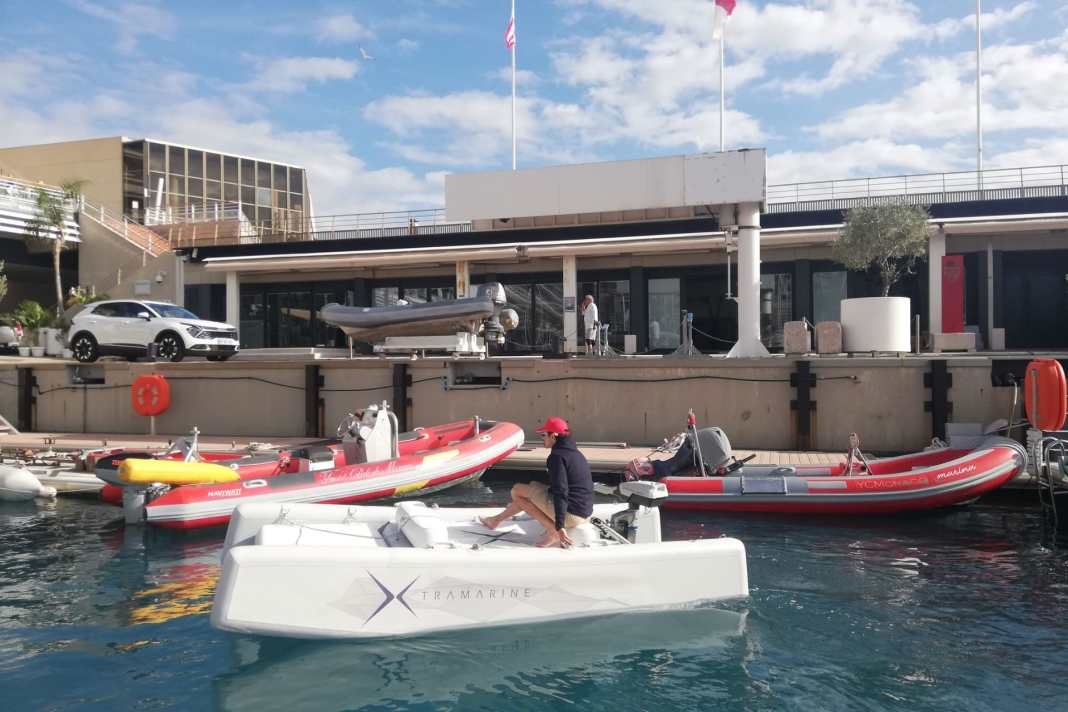 An unusual sight: the X-Fun as a dinghy in the marina.