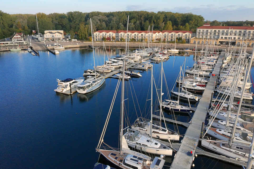 The Boltenhagen Marina with slipway, harbour office and adjacent Lindner Hotel.