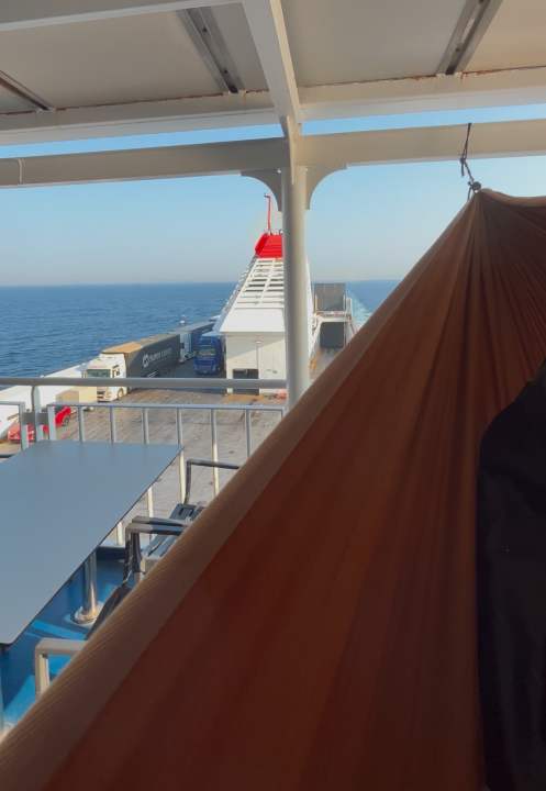 On the ferry crossings, Lisa usually does without a sleeping cabin and simply hangs out in a hammock on deck.
