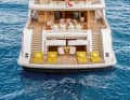 Focus on the beach club: the absence of a jacuzzi or pool meant that the rear section close to the water was of great importance. Fold-out steps lead into the sea for swimming, ...
