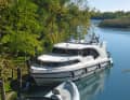 The only houseboat in a wide area: our Minuetto at the public jetty in Caposile