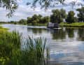 Only the rivers of England are this wide. The canals connecting them are just wide enough for a narrowboat