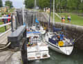 Pleasure craft in the lock stairs of Berg on the Göta Canal