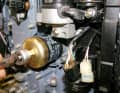 After warming up, the oil filter and oil are replaced on the four-stroke engine