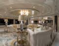Large lounge: the sofa group stands in front of the dining area. The seating was supplied by Pozzoli from Milan, the carpet by Tai Ping