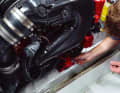 The eight 10 mm bolts with which the "motor feet" are screwed onto the base are inserted and tightened with a ratchet and "17 mm socket".
