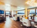 Salon: The dining area for ten guests is transformed into a narrow breakfast bar in the morning. The chandelier was supplied by the Italian company Slamp