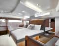 The owner's cabin extends across the entire width of the boat