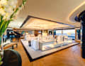 Main deck: The large saloon with a ceiling height of 2.40 metres is adjoined by the library and dining room with space for 16 people. The four metre wide wine cabinet is reminiscent of a safe