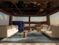 Inside, star architect Piero Lissoni designed the salon with its floor-to-ceiling windows, designer furniture and ...