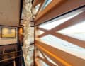 The photos visualise the restricted incidence of light due to the X-structure on the vertical window strip