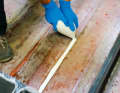 Once the remains of the old stringer system have been removed, the mixed adhesive can be applied using the "spray bag"