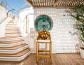 The grating of the sundeck classically shades the open courtyard on the top deck. A large bulleye allows the pool area to be monitored