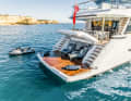 Hinged garage and plenty of space for toys. You can also sunbathe easily on the bathing platform