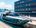Riva 82' Diva: The latest model from La Spezia features large glass surfaces. All GRP hulls are built in Massa and arrive by sea