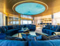 Skylounge: The seating on the bridge deck is arranged in a circle. The dining area and lounge on the aft deck are also circular