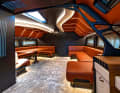 Modern: Stefano Faggioni designed a fully-fledged interior with visible carbon elements of the hull together with the designers from Victory