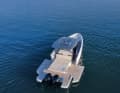 There are comfortable sun loungers and seating on the foredeck and in the cockpit. The folding side walls allow the areas around the sunlounger to grow considerably