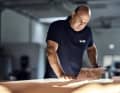 A good eye: Gabor Liptak checks the veneers at List GC. The Austrian family business is proud of its low staff turnover rate