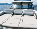 Sunbathing on the foredeck is a pleasure.  An escape hatch is installed under the centre cushion