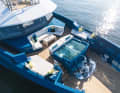 The water in the pool is six °C on one side and 30 °C on the other