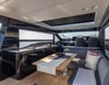 Christian Grande created a dark and cosy design above deck and light and airy below deck with light oak