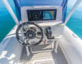 Engine instruments or plotters fit into the dashboard support of the centre console.