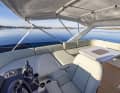 The seating area at the rear of the flybridge is a comfortable "social area". The folding canopy is part of the standard equipment