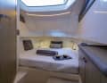 The wet room in the bright cabin has a headroom of 1.85 metres
