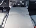 The two seats are separated by a full-length armrest. If required, it can be easily converted into a table for a short car office or for a break in between