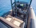 The two displays at the helm are easy to read thanks to the shade from the T-top.