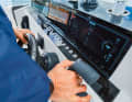 The control stand with two plotters and all the important controls. Special feature: the carbon fibre steering wheel.