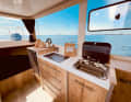 The kitchenette offers a perfect view and everything you need for life on board.