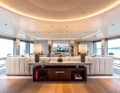Upper deck: saloon with a great view from the floor-to-ceiling windows and of the second XXL screen. Most of the furniture was made by the shipyard itself.