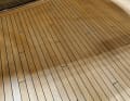 Step 1 - Preparation: The deck has dried out for a few days. The boat is indoors or the weather is consistently dry