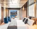 Owner's suite: The dark wooden floor forms a beautiful contrast to the light-coloured interior. On the starboard side, the bulwark opens up to a balcony