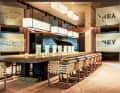 Interior: Guests watch the chef at work from the dining table