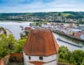 The Danube and Inn flow around the peninsula with the magnificent old town of Passau. The magnificent view can be enjoyed from the Veste Oberhaus, which is enthroned on the north bank