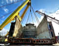 Rear section set down on the transport barge.