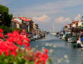 Travelling by charter houseboat on the lagoons of Marano and Grado.