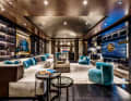 Time for entertainment: the upper deck saloon with grand piano and bar is adjoined by the on-board cinema. Here, the owner and his guests can watch the latest blockbusters on an XL sofa. Designer Margherita Casprini has created an interior in a masculine club style
