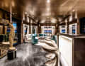 Dark, not gloomy: the owner has a preference for dark woods. The bar in the upper deck saloon serves as a meeting place