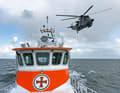 Sea rescue cruiser "Eugen" of the German Maritime Search and Rescue Service (DGzRS) with Sea King search and rescue helicopter of the German Navy