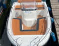The test boat was fitted with special upholstery, synthetic teak and a larger engine.