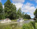 Coming and going on the Västgötadelen, the western half of the Göta Canal near Norrkvarn. During the peak season, which only lasts eight weeks, the historic waterway is very popular