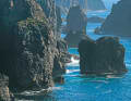 Volcanic rocky coast with the Eshaness lighthouse in the north-west of Mainland. Here, the Atlantic has created a fascinating landscape by eroding the cliffs