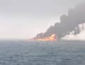 The flames blaze on the high seas, the oil tanker is no longer recognisable.